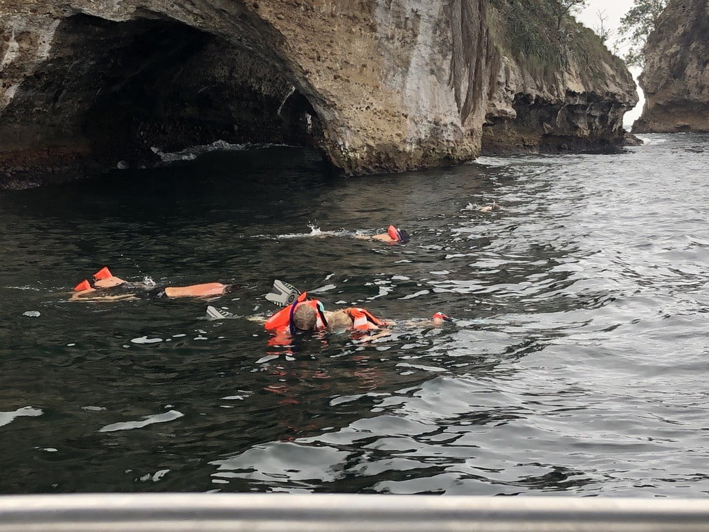family snorkeling near Hyatt Ziva all inclusive Puerto Vallarta Mexico