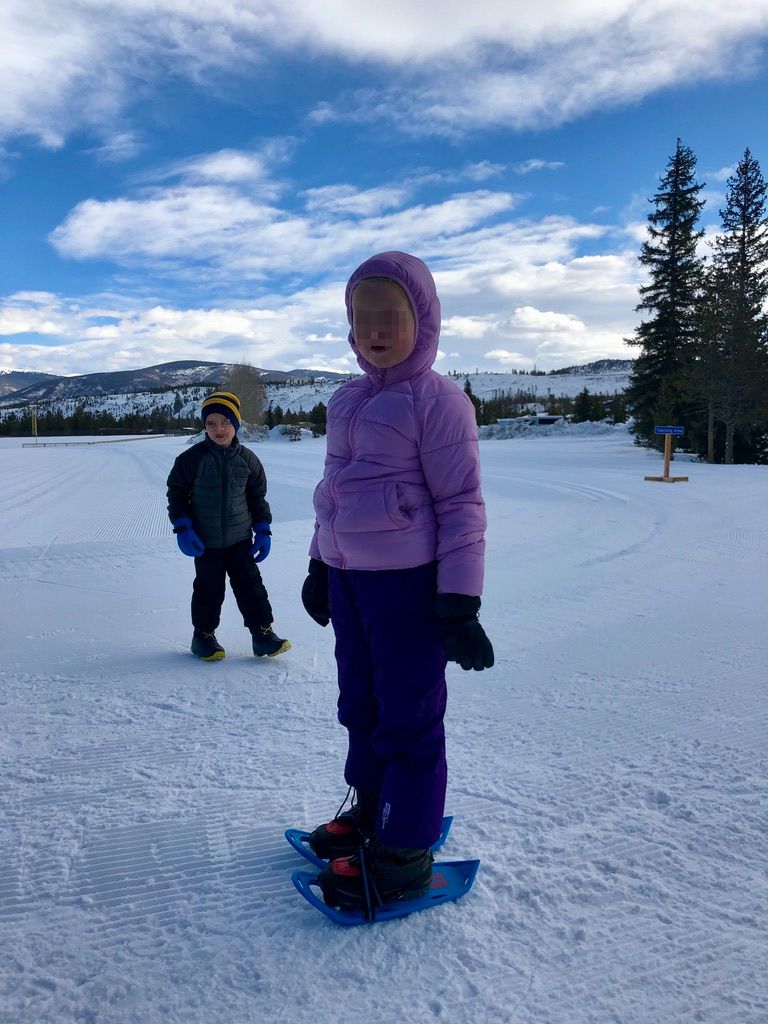 kids bundled up, snowshoeing in Colorado