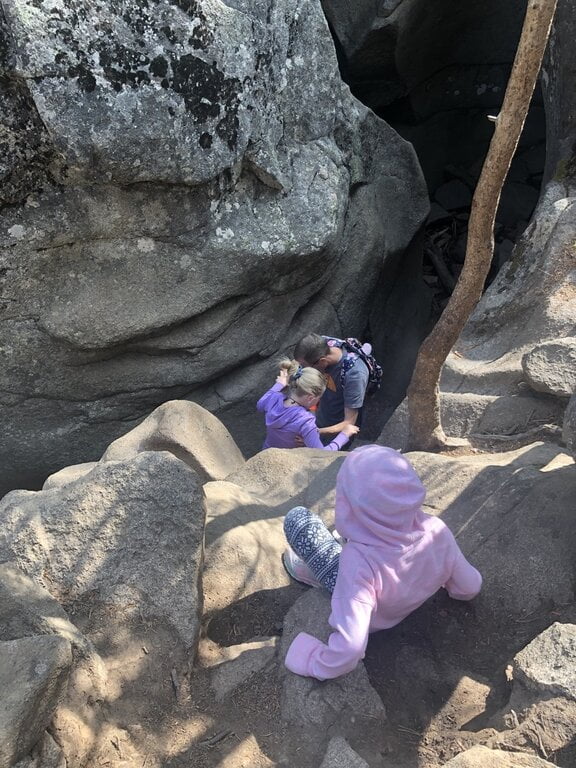 kids climbing down into ice caves, grottos trail, Aspen Colorado