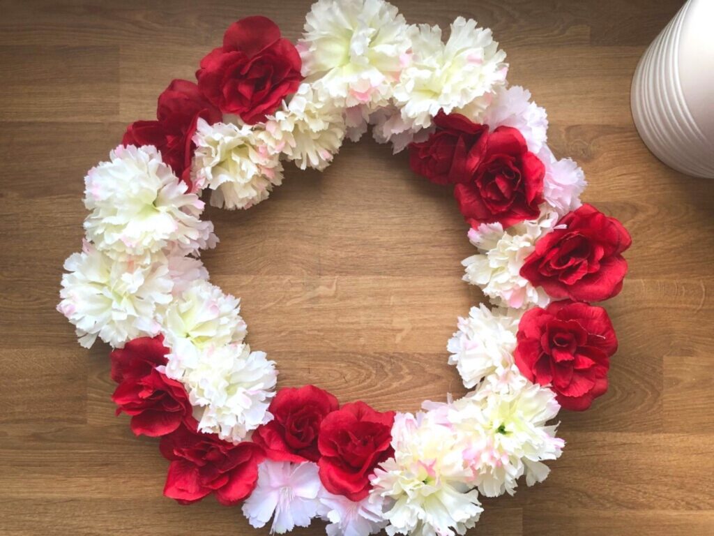white, pink, red flowers on a wreath