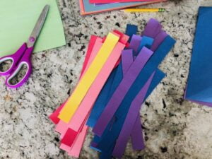 cut out strips of colored paper