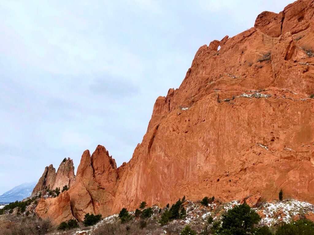 Garden of the Gods  large red rock wall with snow