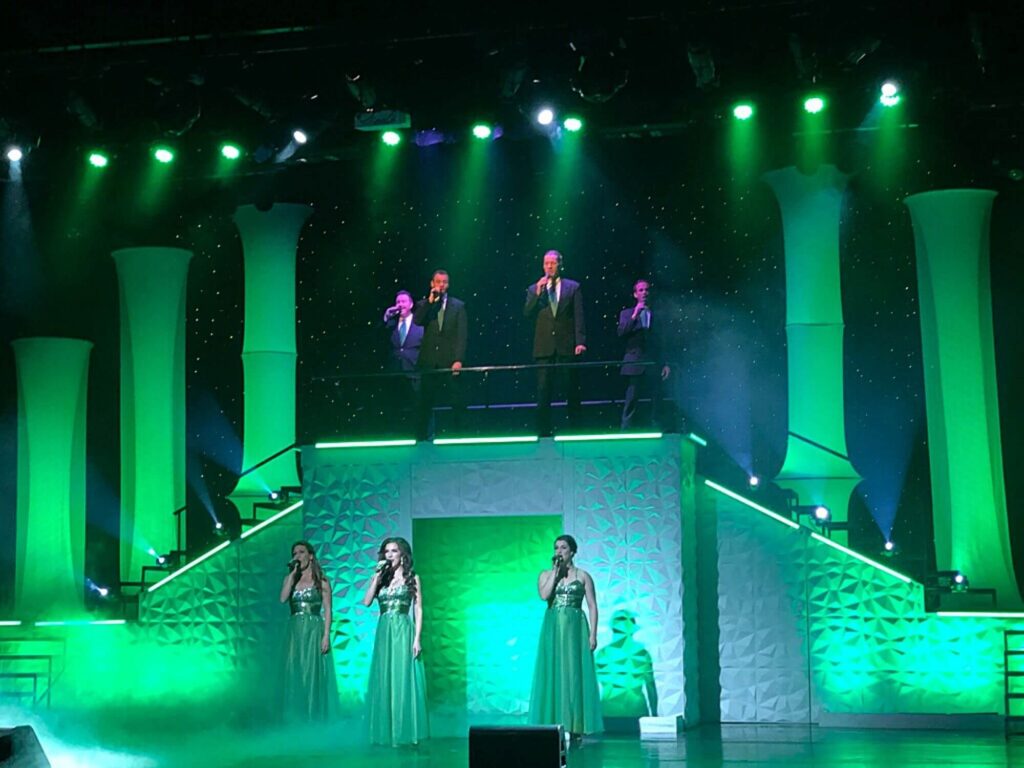 Irish singers, green dresses and green lighting performing in Branson Missouri