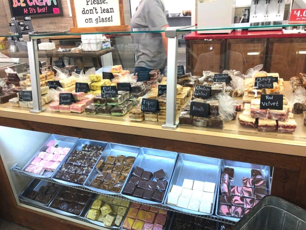 counter filled with various fudge