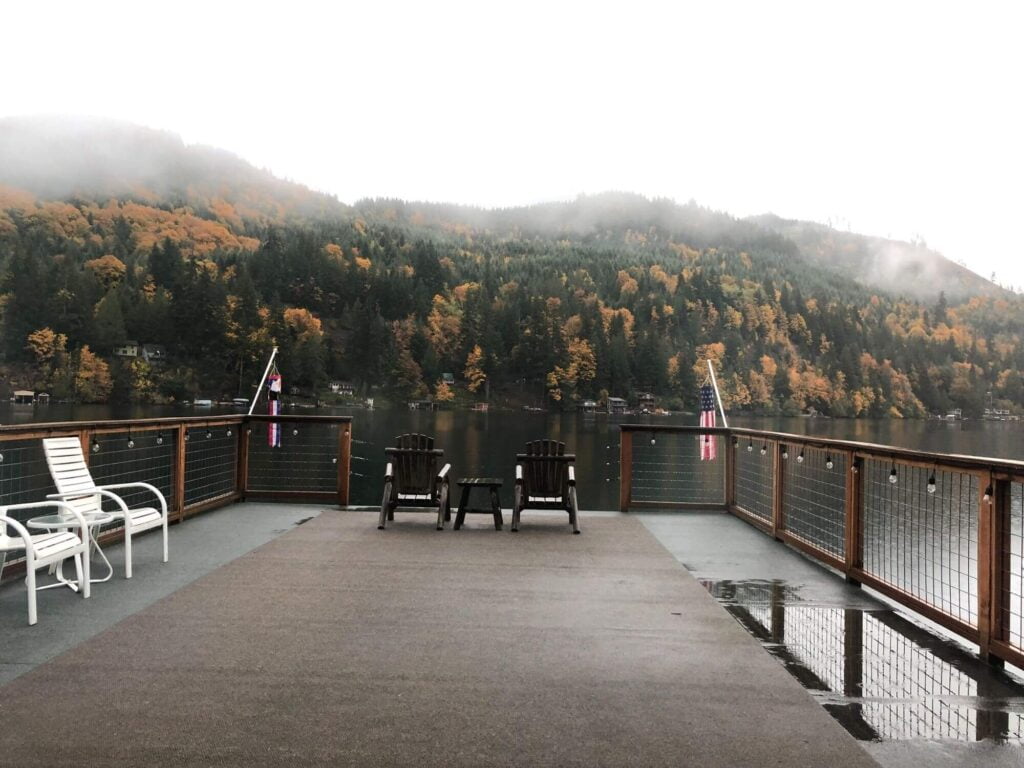 Lakefront rental at Olympic National Park deck over the lake with fall colors across the lake