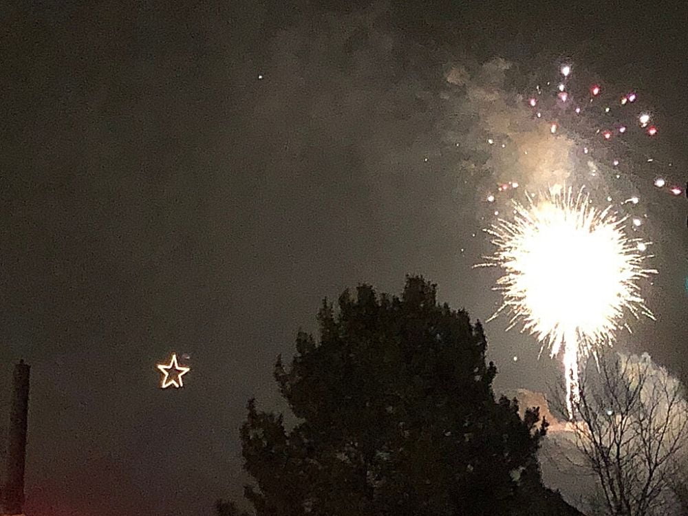 lit up star and fireworks at Castle Rock star lighting ceremony 