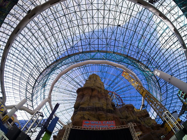Things to do in Las Vegas with kids Adventuredome at Circus Circus.  Glass top ceiling looking to blue sky