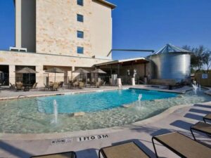 Where to Stay in San Antonio holiday inn. Blue pool with little fountains