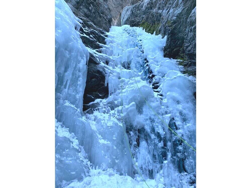 Zapata falls in winter frozen waterfall