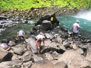 La Fortuna Waterfall pool access rocks