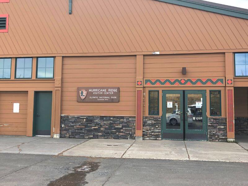 large brown building that is the visitor center at hurricane ridge Olympic national park