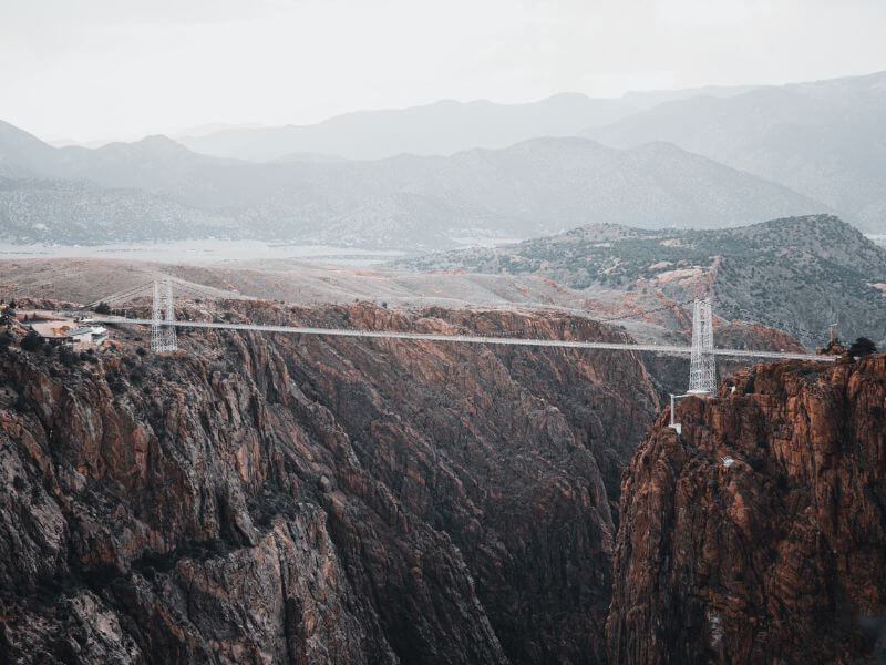 Royal Gorge bridge in the fog, big canyon below