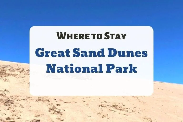 Sand hill and blue sky with text overlay "Where to stay Great Sand Dunes National Park"