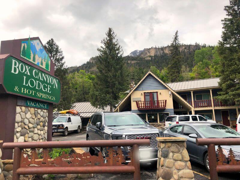 Box Canyon hotel from parking lot with hotel sign in front