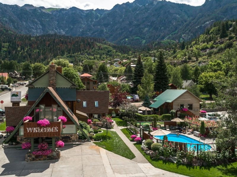 drone view of Twin Peaks Hot springs in Ouray, Colorado. Lodge with pool to the right side