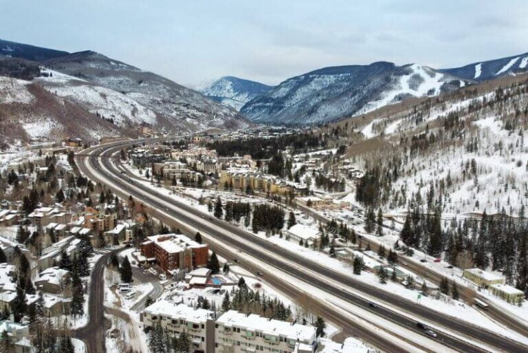 road from Vail to Breckenridge covered in snow on the mountains and town