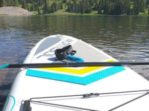 paddle board sitting on a lake