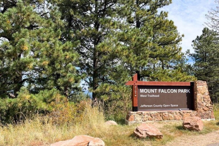 Mount Falcon Park sign in front of tall pine trees