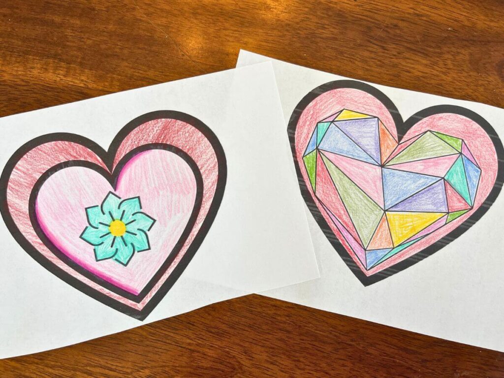 paper heart designs that are colored in various colors