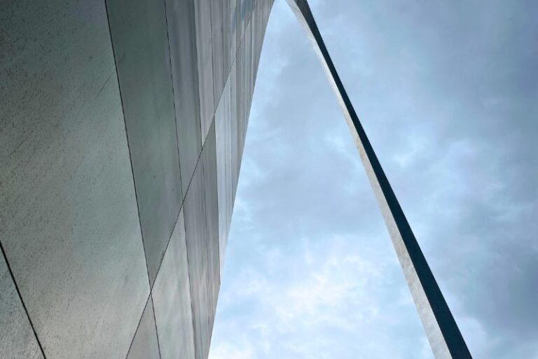 close up and looking straight up at the Gateway Arch, a free place to visit in St. Louis