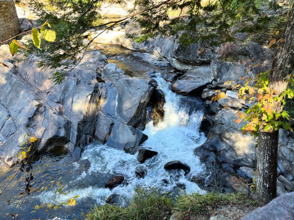 The Sinks is the easiest waterfalls in Great Smoky Mountains National Park to see. A large rock area with a smaller but powerful waterfalls flowing down